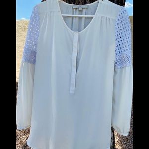 White Loft brand shirt.